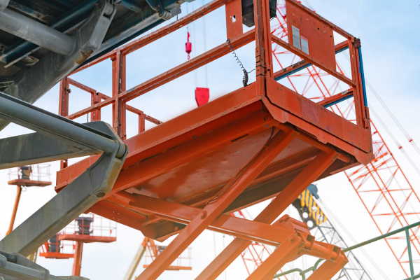 Orange boom lift